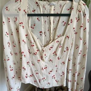 Reformation Cream Blouse with Red Cherry Design